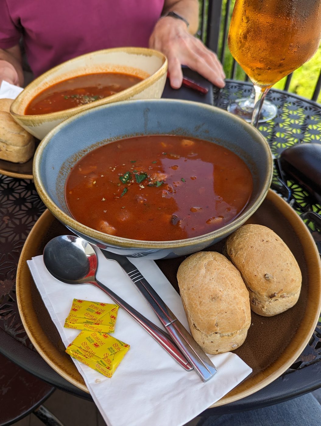Tomato soup with bread rolls