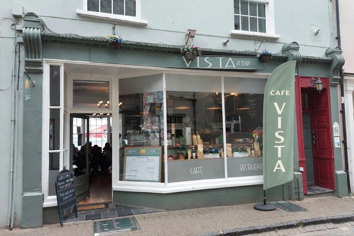 The green shopfront of Cafe Vista on Crackwell Street, with VISTA above the windows